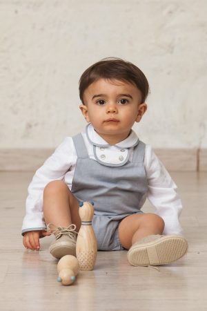 linen baby shirt with ceremonial piping