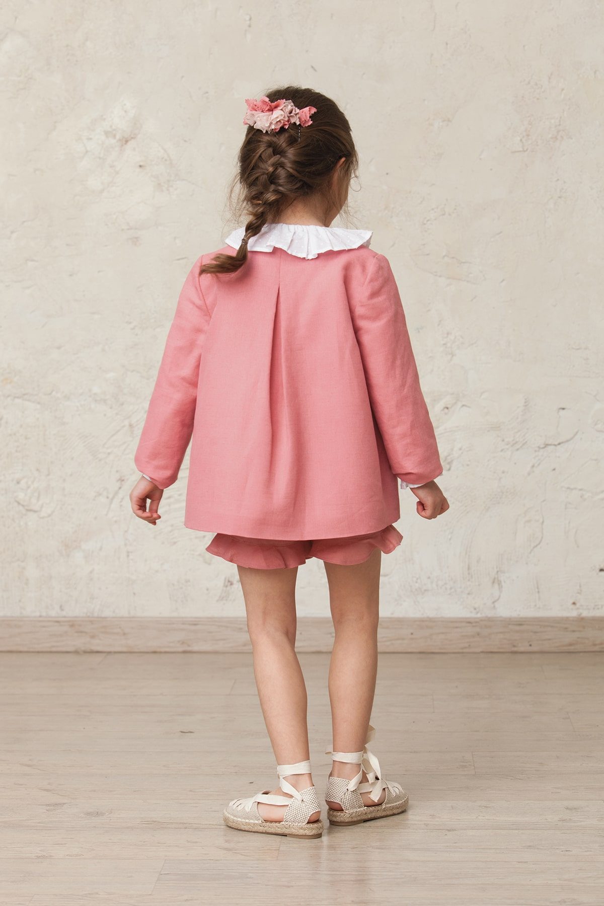 chaqueta rosa de ceremonia de niña