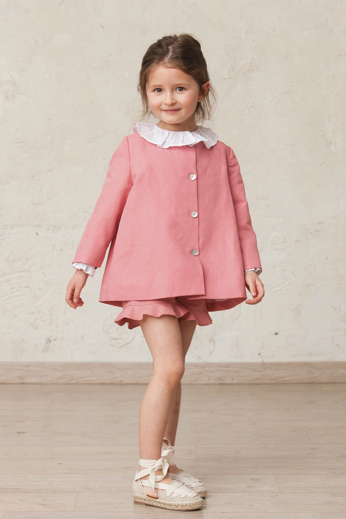 chaqueta rosa de ceremonia de niña