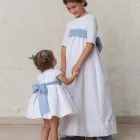 blue sash with bow for baby girl ceremony
