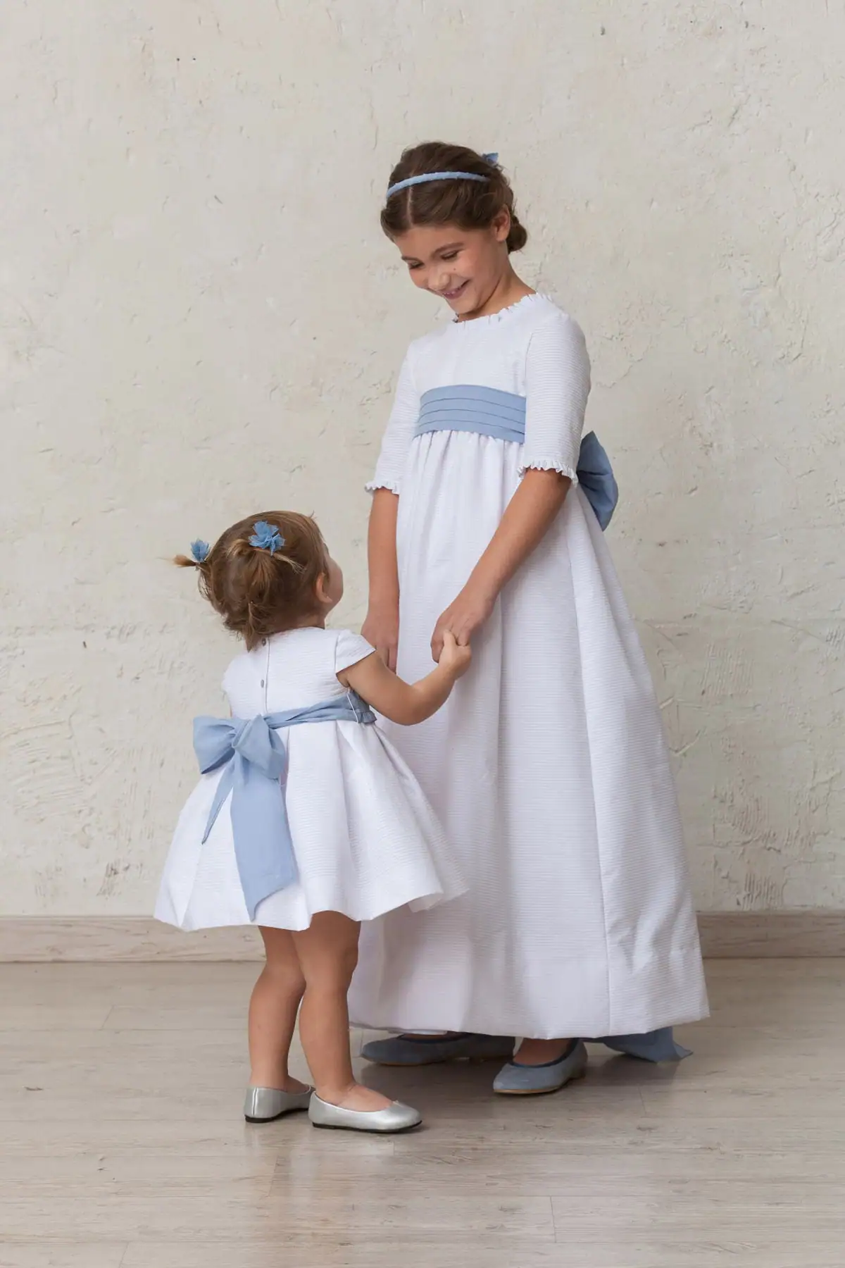 blue sash with bow for baby girl ceremony