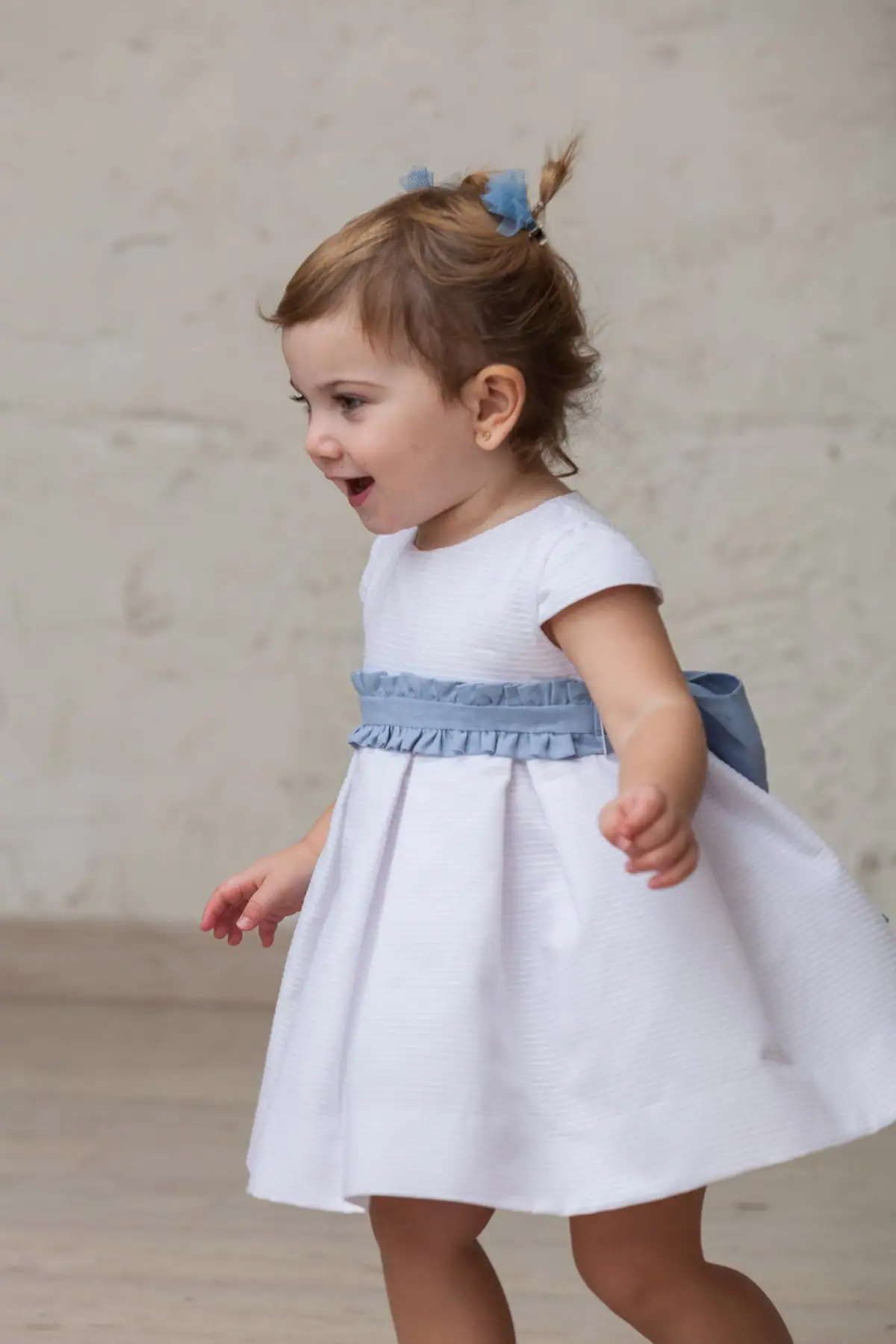 blue linen sash with bow for baby girl ceremony