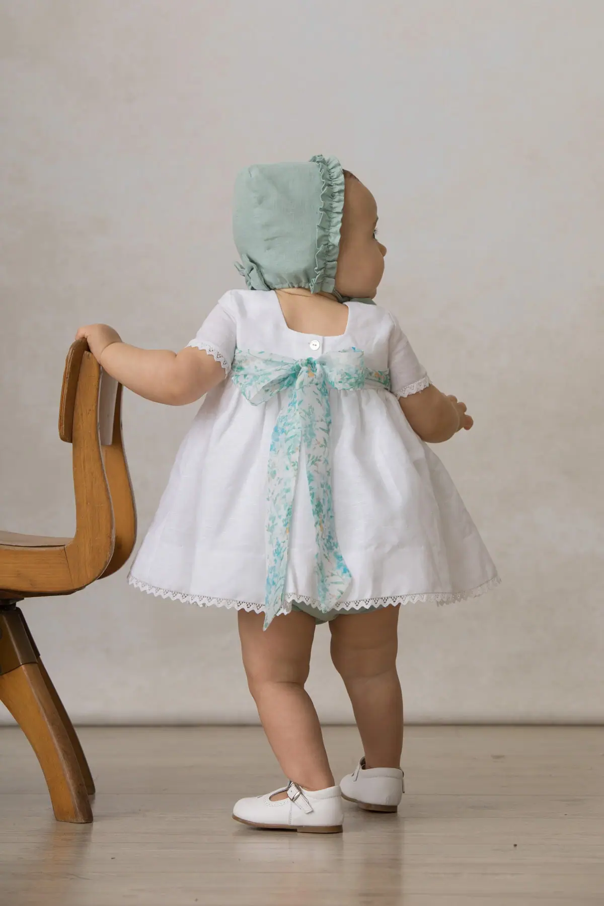 baby bonnet for formal occasions, green with bow