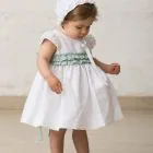 white baby bonnet with ruffle