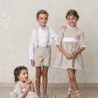 Bermuda shorts, trench coat, boy's winter ceremony