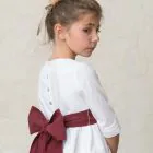 white dress for a girl's ceremony with laces