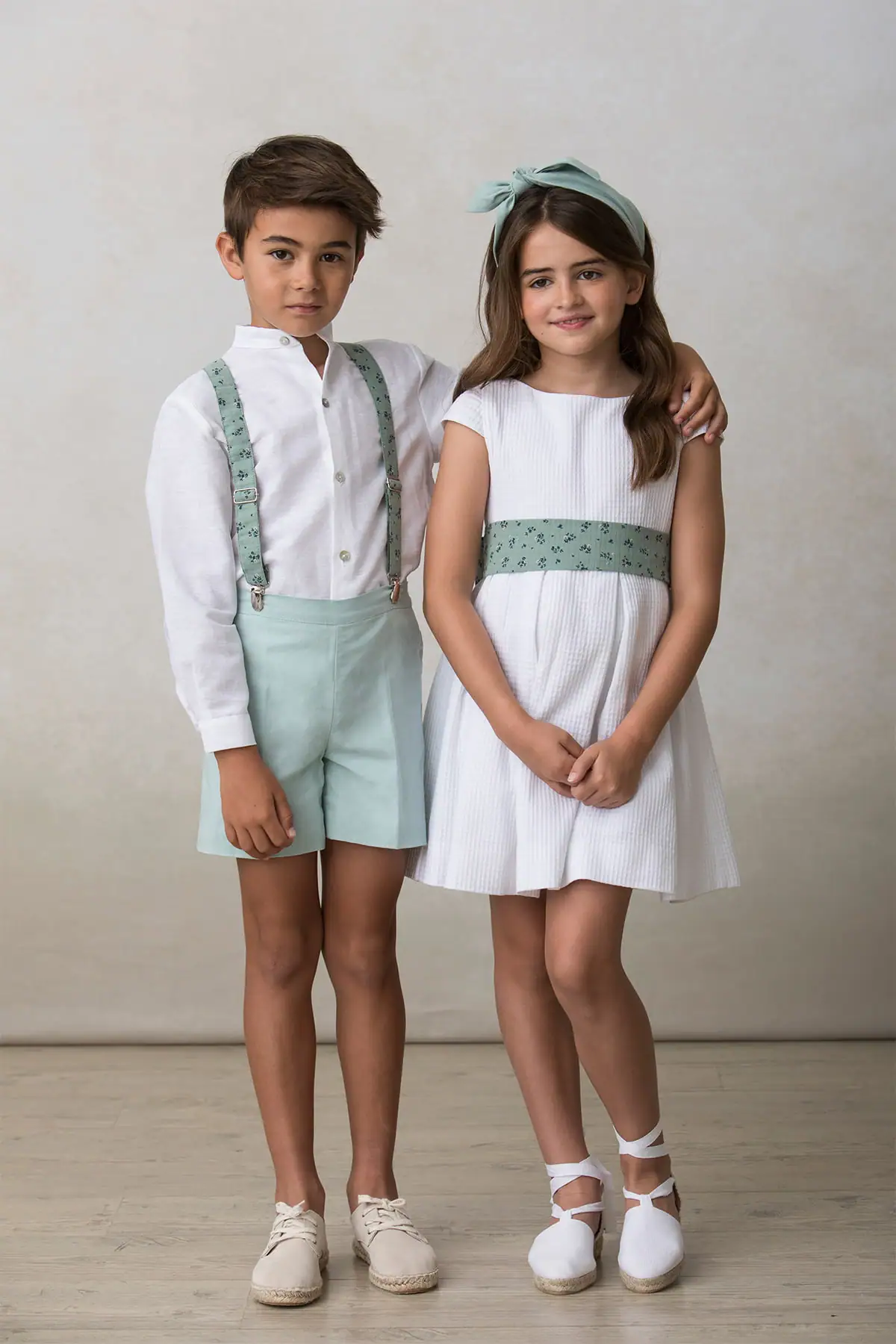 green boy's Bermuda shorts