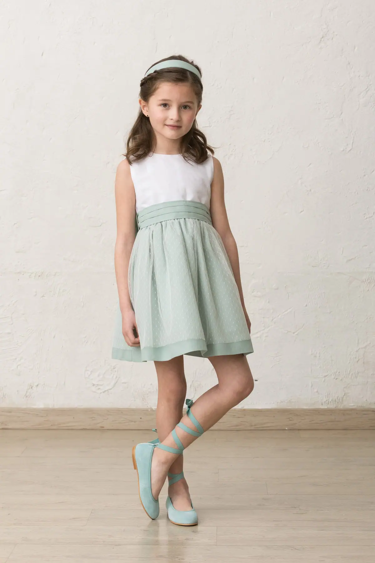 green polka dot girl's ceremony dress