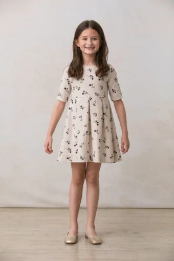 beige girl dress with navy blue flowers