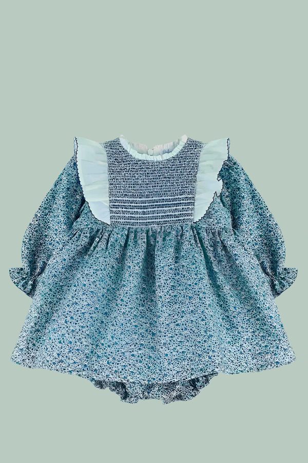 vestido de bebe de estampado azul con volantes blancos