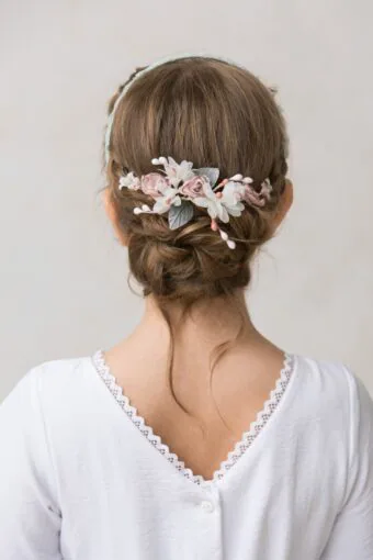half crown of white and pink flowers for a girl's hair for a ceremony